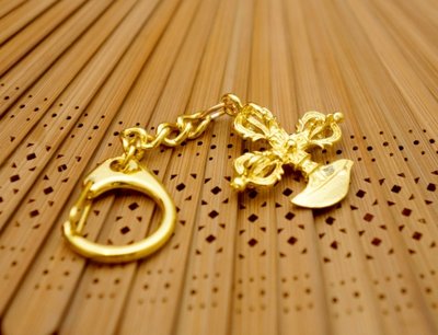 Брелок у золотому кольорі Символи Фен Шуй Ваджра 9180025 фото